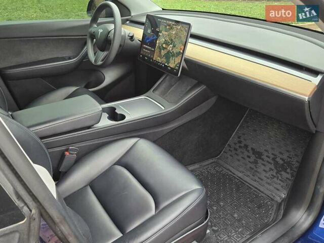 Синий Тесла Model Y, объемом двигателя 0 л и пробегом 99 тыс. км за 25500 $, фото 22 на Automoto.ua