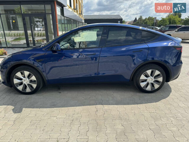 Синий Тесла Model Y, объемом двигателя 0 л и пробегом 83 тыс. км за 24999 $, фото 3 на Automoto.ua