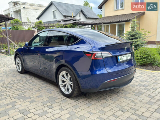 Синий Тесла Model Y, объемом двигателя 0 л и пробегом 57 тыс. км за 24300 $, фото 4 на Automoto.ua