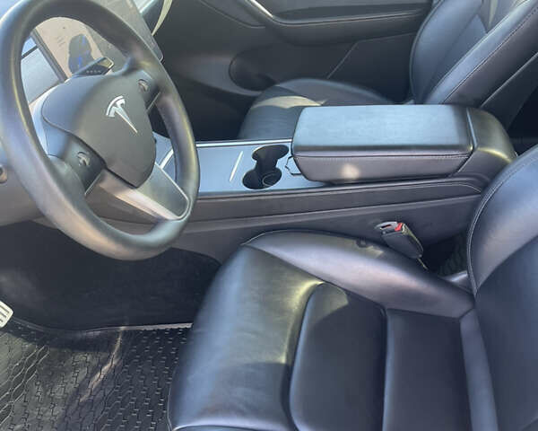 Синий Тесла Model Y, объемом двигателя 0 л и пробегом 127 тыс. км за 24700 $, фото 14 на Automoto.ua