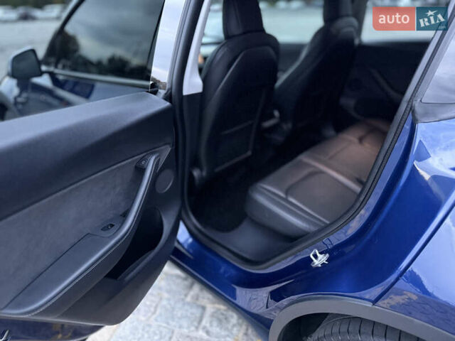 Тесла Model Y 2021 в Харькове на Automoto.ua Синий Тесла Model Y, объемом двигателя 0 л и пробегом 113 тыс. км за 21200 $, фото 56 на Automoto.ua