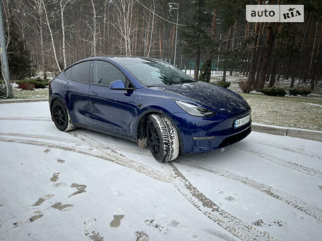 Синий Тесла Model Y, объемом двигателя 0 л и пробегом 66 тыс. км за 25000 $, фото 1 на Automoto.ua