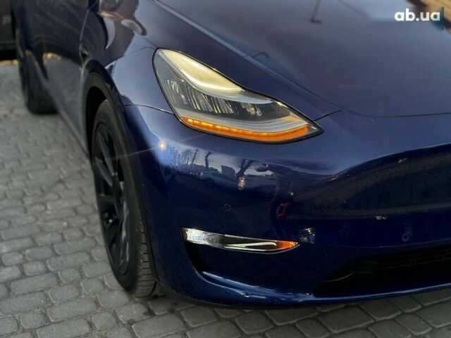 Синий Тесла Model Y, объемом двигателя 0 л и пробегом 83 тыс. км за 28000 $, фото 12 на Automoto.ua
