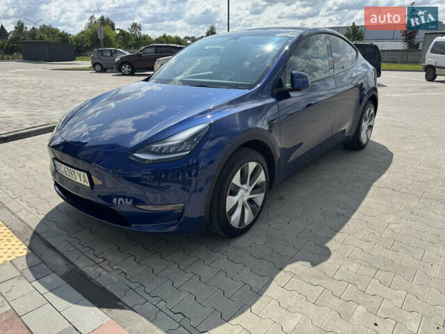 Синий Тесла Model Y, объемом двигателя 0 л и пробегом 83 тыс. км за 24999 $, фото 2 на Automoto.ua