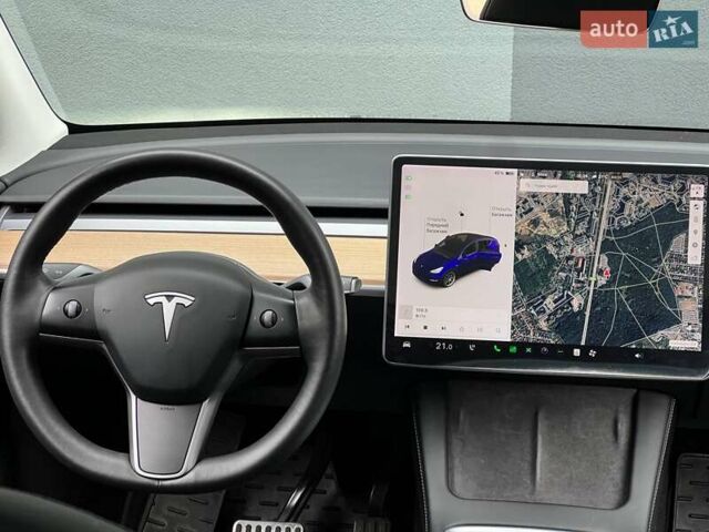 Синий Тесла Model Y, объемом двигателя 0 л и пробегом 66 тыс. км за 25500 $, фото 19 на Automoto.ua
