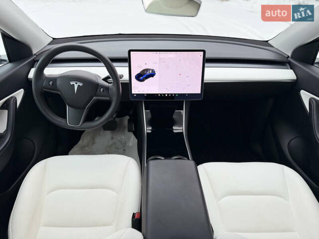 Синий Тесла Model Y, объемом двигателя 0 л и пробегом 63 тыс. км за 27000 $, фото 11 на Automoto.ua