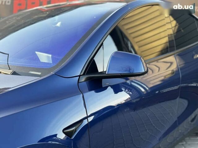 Синий Тесла Model Y, объемом двигателя 0 л и пробегом 83 тыс. км за 28000 $, фото 8 на Automoto.ua