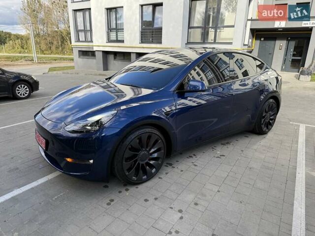 Синий Тесла Model Y, объемом двигателя 0 л и пробегом 86 тыс. км за 25900 $, фото 1 на Automoto.ua