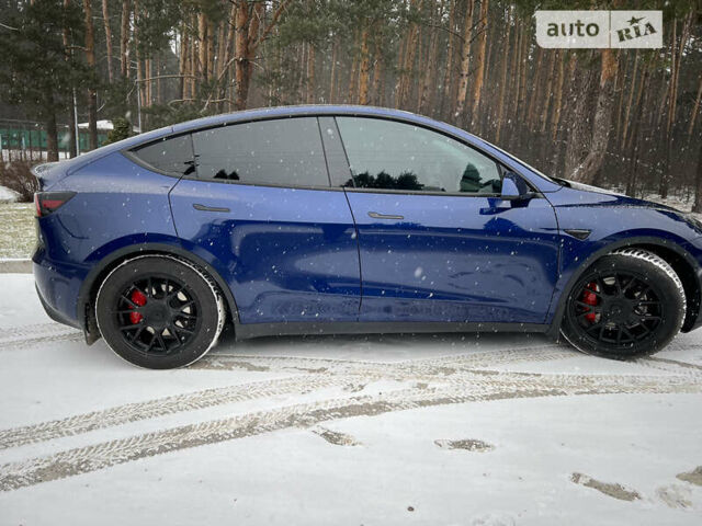 Синий Тесла Model Y, объемом двигателя 0 л и пробегом 66 тыс. км за 25000 $, фото 2 на Automoto.ua