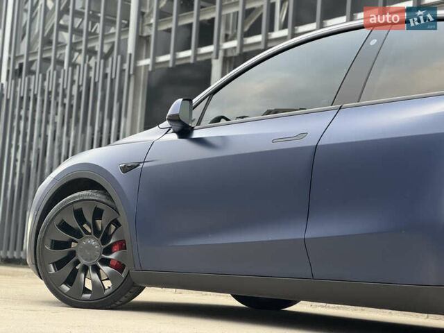 Синий Тесла Model Y, объемом двигателя 0 л и пробегом 88 тыс. км за 31990 $, фото 9 на Automoto.ua