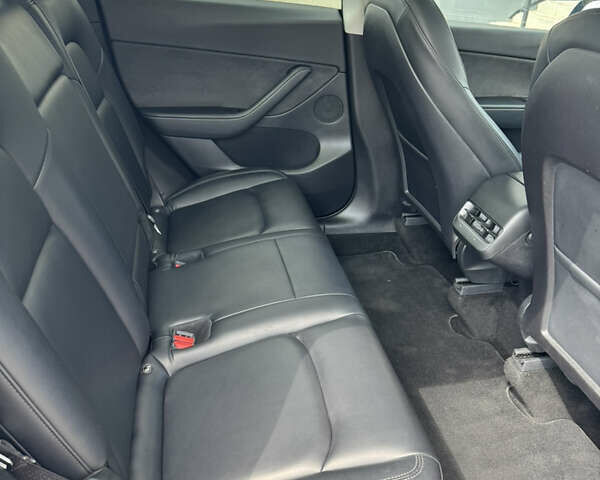 Синий Тесла Model Y, объемом двигателя 0 л и пробегом 83 тыс. км за 24999 $, фото 23 на Automoto.ua