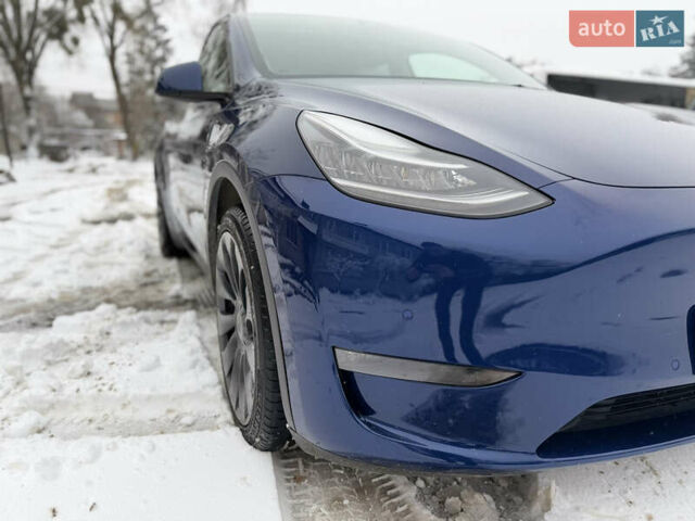 Синий Тесла Model Y, объемом двигателя 0 л и пробегом 63 тыс. км за 27000 $, фото 3 на Automoto.ua