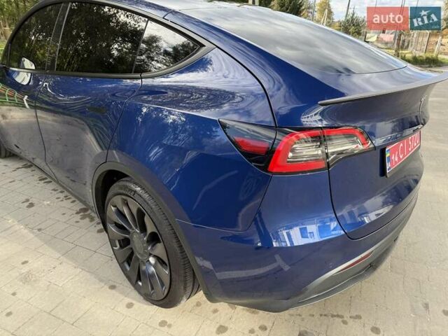 Синий Тесла Model Y, объемом двигателя 0 л и пробегом 86 тыс. км за 25900 $, фото 61 на Automoto.ua