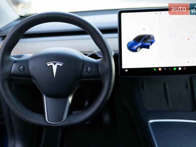 Синий Тесла Model Y, объемом двигателя 0 л и пробегом 42 тыс. км за 27000 $, фото 19 на Automoto.ua