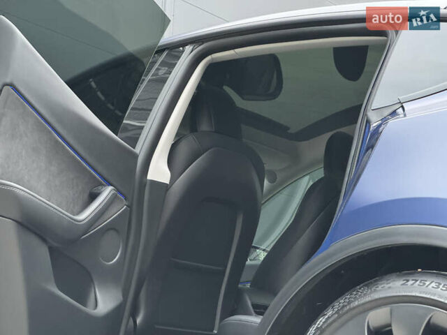 Синий Тесла Model Y, объемом двигателя 0 л и пробегом 88 тыс. км за 31990 $, фото 34 на Automoto.ua