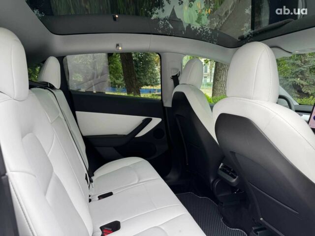Тесла Model Y 2021 в Киеве на Automoto.ua Синий Тесла Model Y, объемом двигателя 0 л и пробегом 86 тыс. км за 19390 $, фото 24 на Automoto.ua