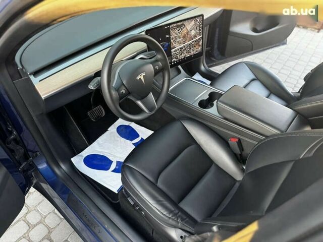 Синий Тесла Model Y, объемом двигателя 0 л и пробегом 83 тыс. км за 28000 $, фото 5 на Automoto.ua