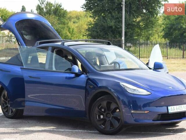Синий Тесла Model Y, объемом двигателя 0 л и пробегом 81 тыс. км за 25499 $, фото 14 на Automoto.ua