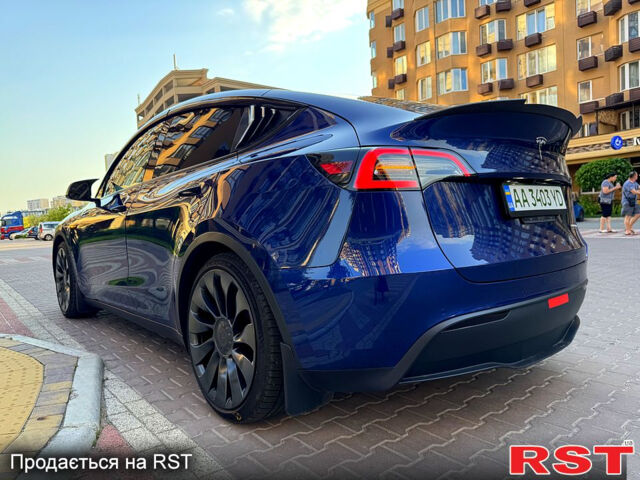 Синий Тесла Model Y, объемом двигателя 0.38 л и пробегом 70 тыс. км за 22000 $, фото 2 на Automoto.ua