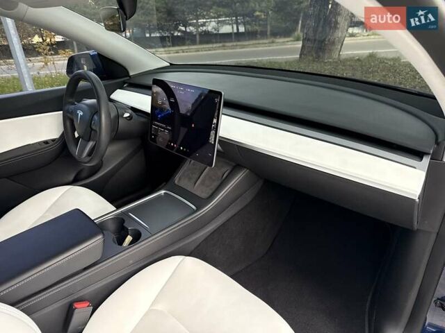 Синий Тесла Model Y, объемом двигателя 0 л и пробегом 87 тыс. км за 23999 $, фото 48 на Automoto.ua
