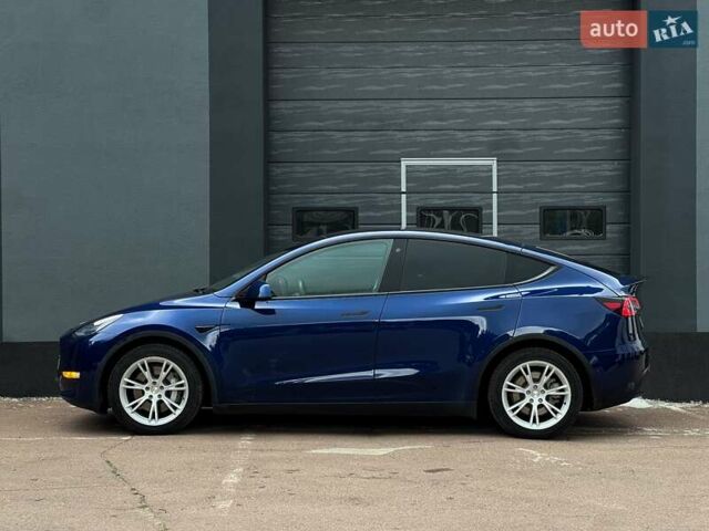 Синий Тесла Model Y, объемом двигателя 0 л и пробегом 66 тыс. км за 25500 $, фото 5 на Automoto.ua