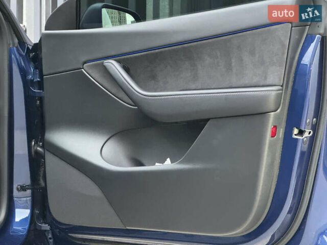 Синий Тесла Model Y, объемом двигателя 0 л и пробегом 88 тыс. км за 31990 $, фото 36 на Automoto.ua