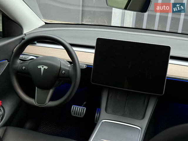 Синий Тесла Model Y, объемом двигателя 0 л и пробегом 88 тыс. км за 31990 $, фото 42 на Automoto.ua