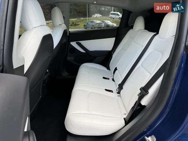 Синий Тесла Model Y, объемом двигателя 0 л и пробегом 86 тыс. км за 25900 $, фото 72 на Automoto.ua