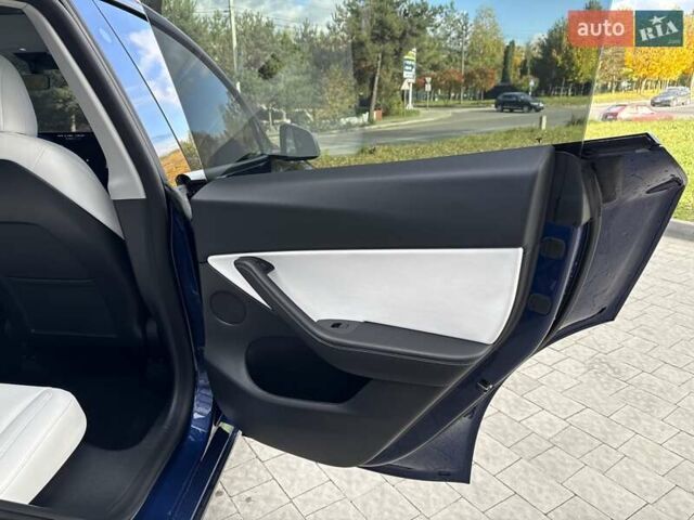 Синий Тесла Model Y, объемом двигателя 0 л и пробегом 86 тыс. км за 25900 $, фото 77 на Automoto.ua