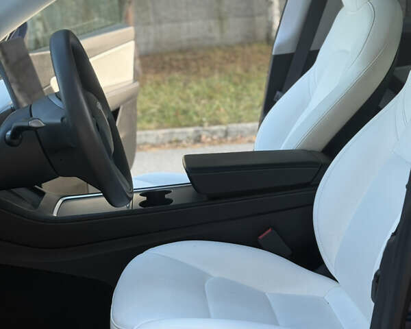 Синий Тесла Model Y, объемом двигателя 0 л и пробегом 97 тыс. км за 26500 $, фото 15 на Automoto.ua