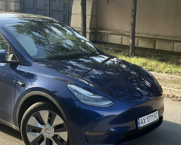 Синий Тесла Model Y, объемом двигателя 0 л и пробегом 97 тыс. км за 26500 $, фото 1 на Automoto.ua