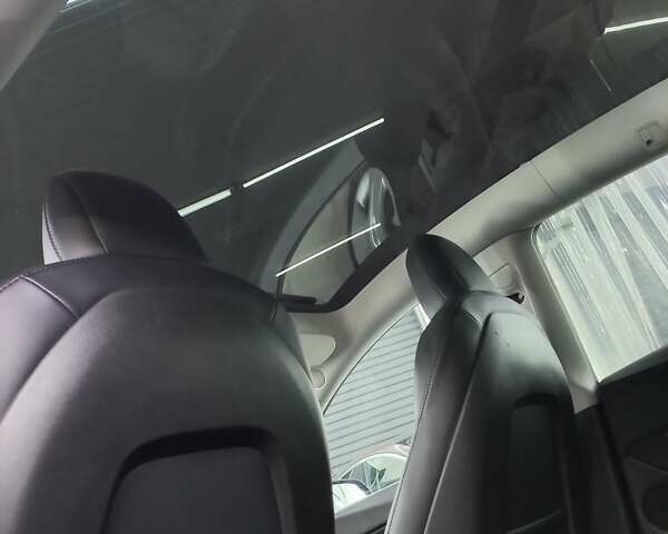 Синий Тесла Model Y, объемом двигателя 0 л и пробегом 91 тыс. км за 25850 $, фото 6 на Automoto.ua