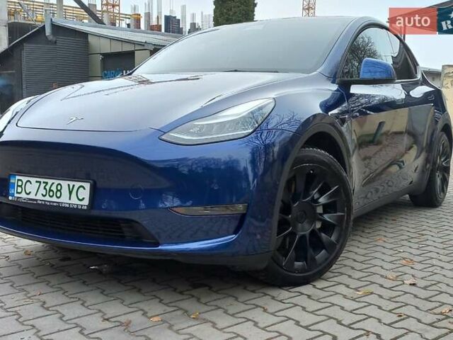 Синий Тесла Model Y, объемом двигателя 0 л и пробегом 91 тыс. км за 25850 $, фото 4 на Automoto.ua