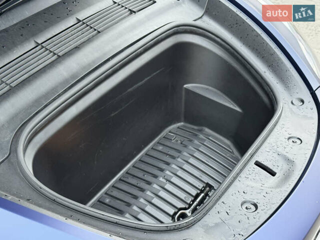 Синий Тесла Model Y, объемом двигателя 0 л и пробегом 88 тыс. км за 31990 $, фото 16 на Automoto.ua