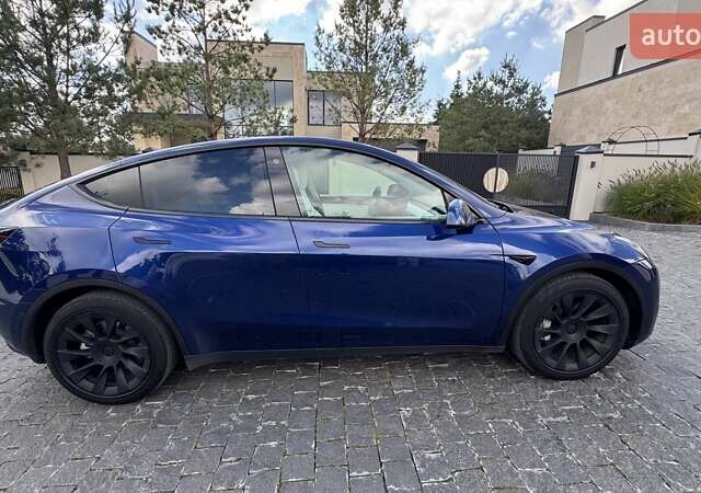 Синій Тесла Model Y, об'ємом двигуна 0 л та пробігом 66 тис. км за 28351 $, фото 8 на Automoto.ua