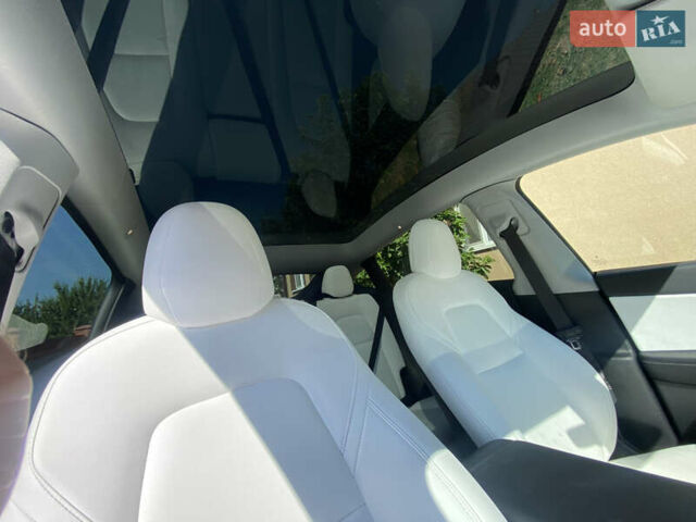 Синій Тесла Model Y, об'ємом двигуна 0 л та пробігом 61 тис. км за 22500 $, фото 16 на Automoto.ua