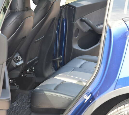 Синий Тесла Model Y, объемом двигателя 0 л и пробегом 81 тыс. км за 25499 $, фото 29 на Automoto.ua