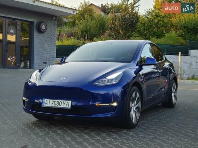 Синий Тесла Model Y, объемом двигателя 0 л и пробегом 99 тыс. км за 26500 $, фото 7 на Automoto.ua