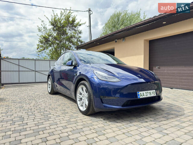 Синий Тесла Model Y, объемом двигателя 0 л и пробегом 57 тыс. км за 24300 $, фото 1 на Automoto.ua
