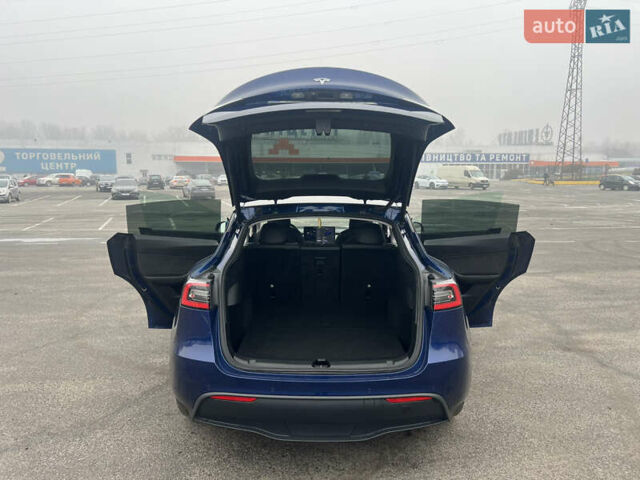 Синий Тесла Model Y, объемом двигателя 0 л и пробегом 125 тыс. км за 25997 $, фото 9 на Automoto.ua