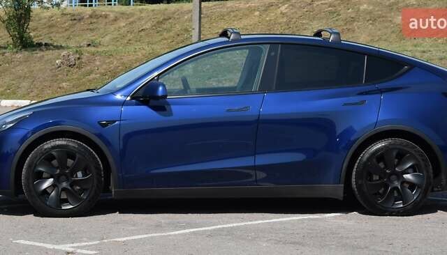 Синий Тесла Model Y, объемом двигателя 0 л и пробегом 81 тыс. км за 25499 $, фото 8 на Automoto.ua