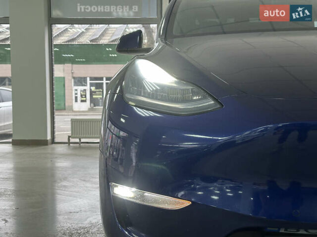 Синий Тесла Model Y, объемом двигателя 0 л и пробегом 122 тыс. км за 27500 $, фото 2 на Automoto.ua