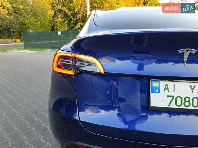 Синий Тесла Model Y, объемом двигателя 0 л и пробегом 99 тыс. км за 26500 $, фото 30 на Automoto.ua