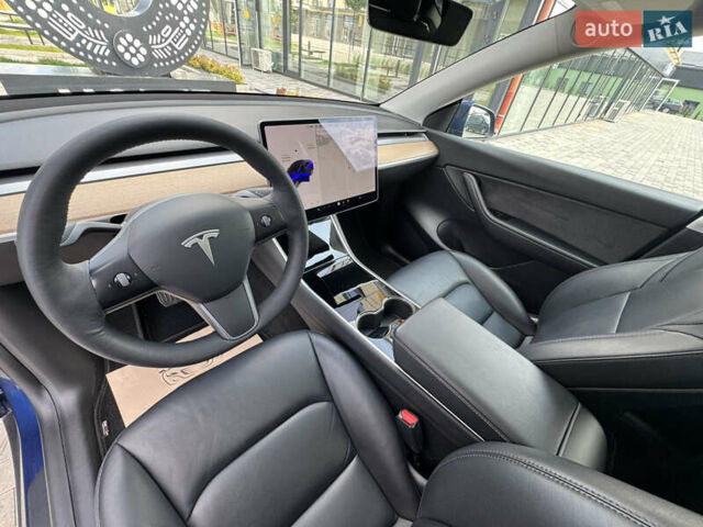 Синий Тесла Model Y, объемом двигателя 0 л и пробегом 83 тыс. км за 24999 $, фото 20 на Automoto.ua