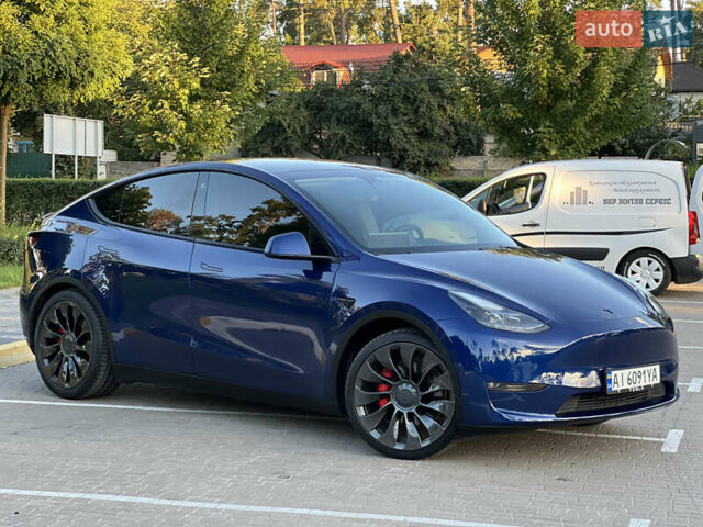 Синий Тесла Model Y, объемом двигателя 0 л и пробегом 84 тыс. км за 26900 $, фото 2 на Automoto.ua