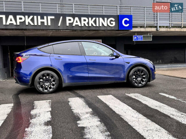 Синий Тесла Model Y, объемом двигателя 0 л и пробегом 104 тыс. км за 22900 $, фото 9 на Automoto.ua