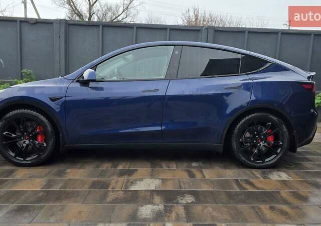 Синій Тесла Model Y, об'ємом двигуна 0 л та пробігом 88 тис. км за 25452 $, фото 6 на Automoto.ua