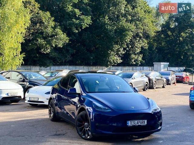 Синий Тесла Model Y, объемом двигателя 0 л и пробегом 92 тыс. км за 31999 $, фото 1 на Automoto.ua