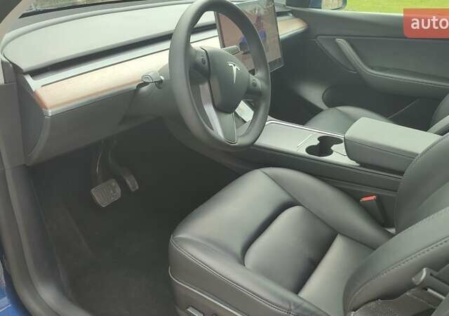 Синий Тесла Model Y, объемом двигателя 0 л и пробегом 54 тыс. км за 29900 $, фото 50 на Automoto.ua