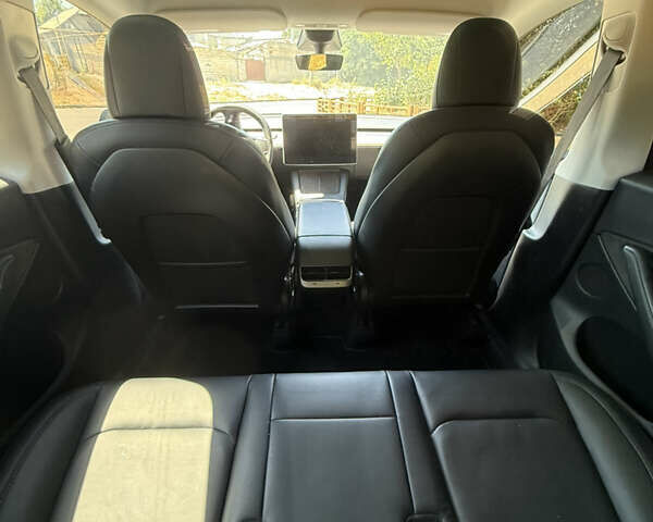 Синий Тесла Model Y, объемом двигателя 0 л и пробегом 137 тыс. км за 25000 $, фото 10 на Automoto.ua
